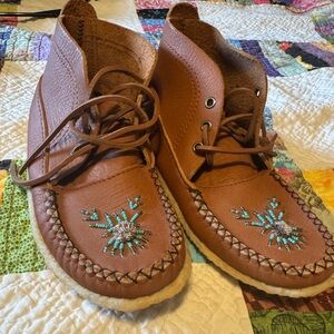 Genuine leather, handmade hand stitched mocassins.
